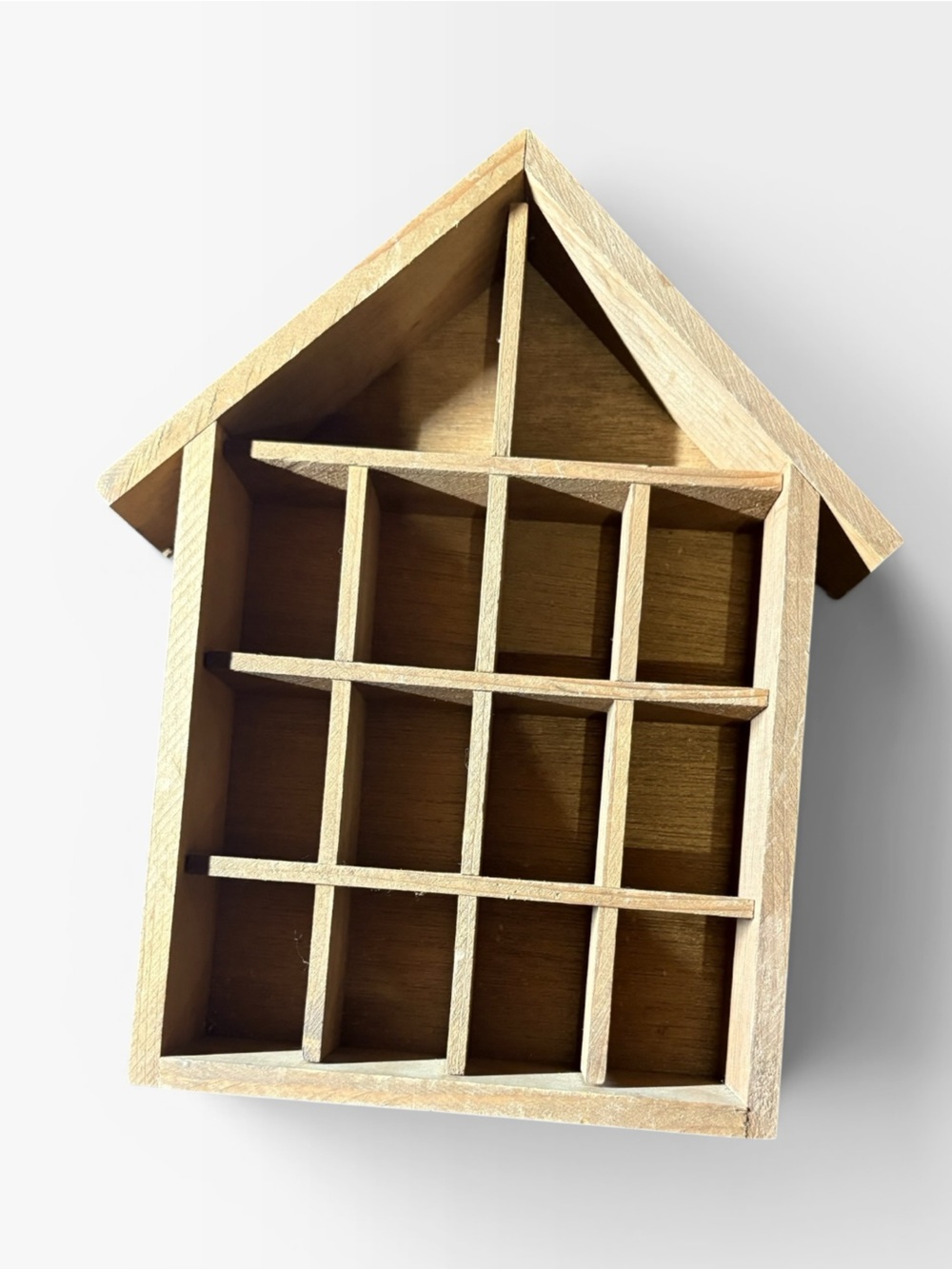 Small house trinket shelf hung by wire